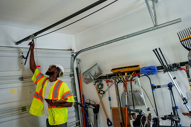 Professional Garage Door technician working in The Pinery, CO